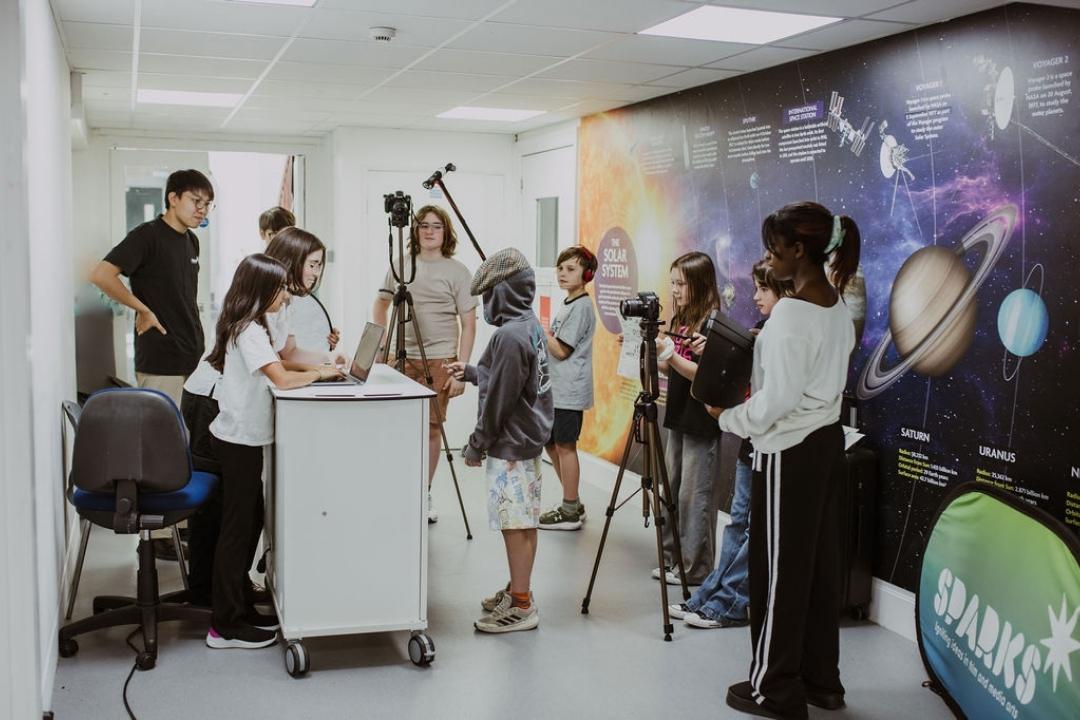 The Creative Skills Crisis (1) A young film crew of Sparks Film School students are gathered on a film set
